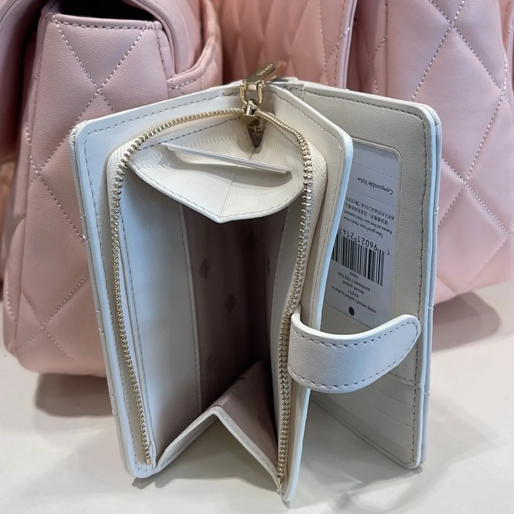 Kate Spade Carey Medium Compartment Bifold Wallet 
COLOR: Parchment - Picture 10 of 16